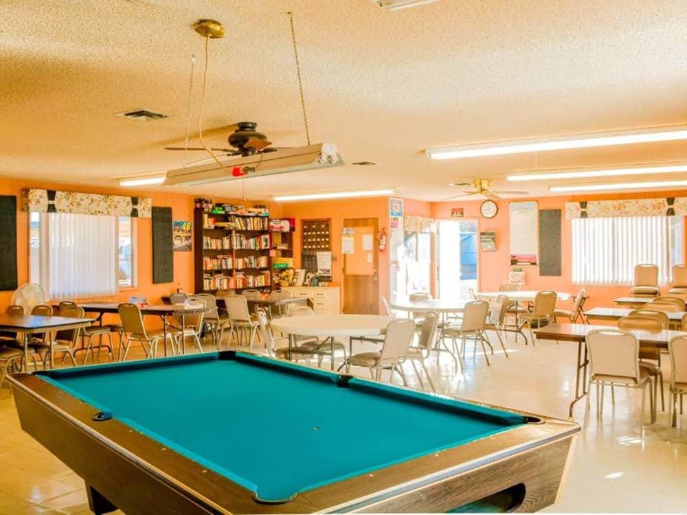 A billiard table in the rec hall