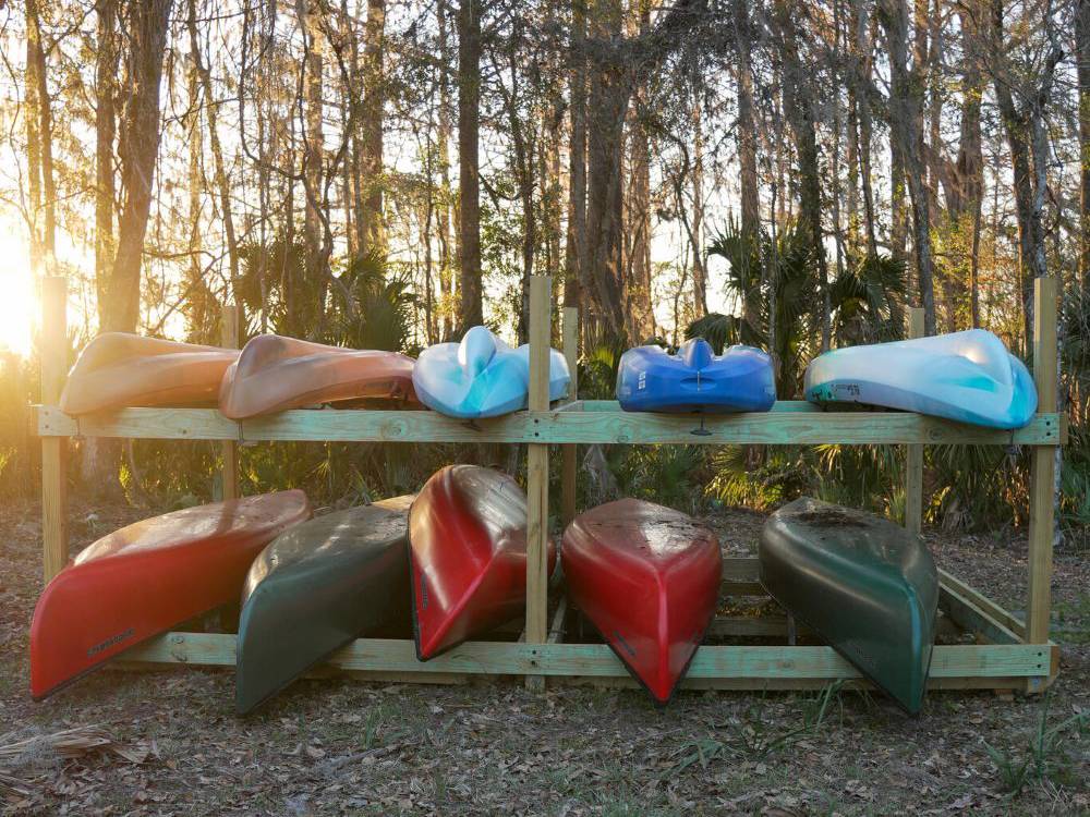 Kayaks stacked on racks