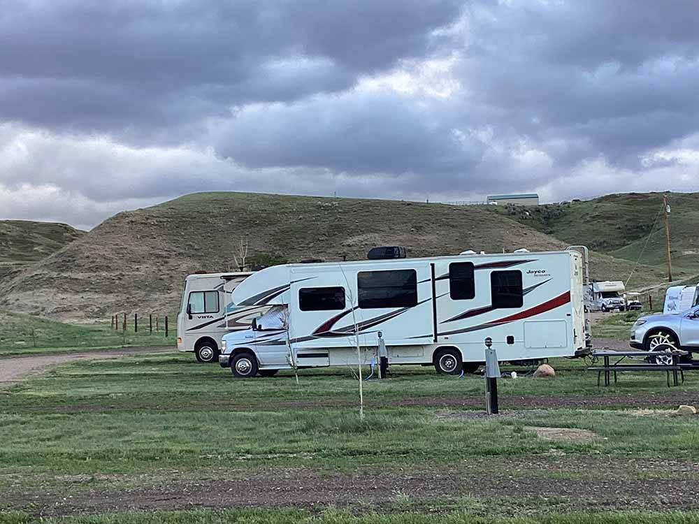 A row of gravel RV sites at HANSEN FAMILY CAMPGROUND & STORAGE