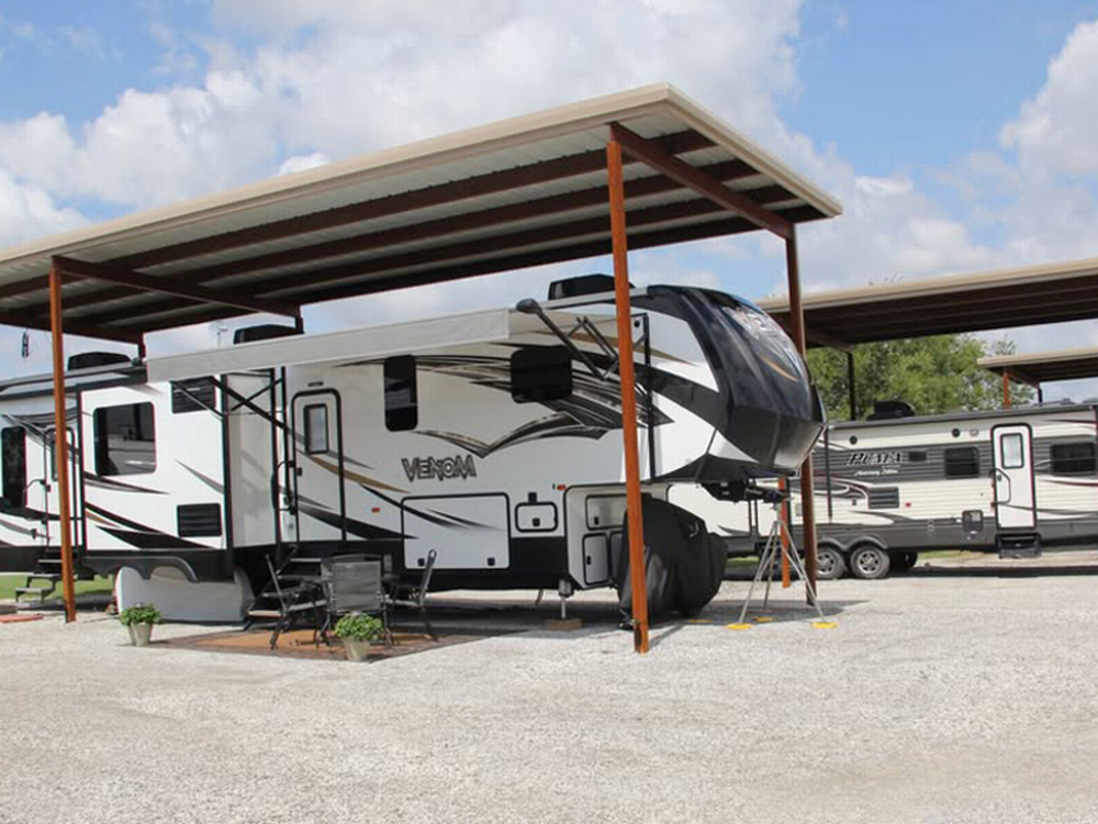 Covered parked trailer at Good Shepherd RV Park