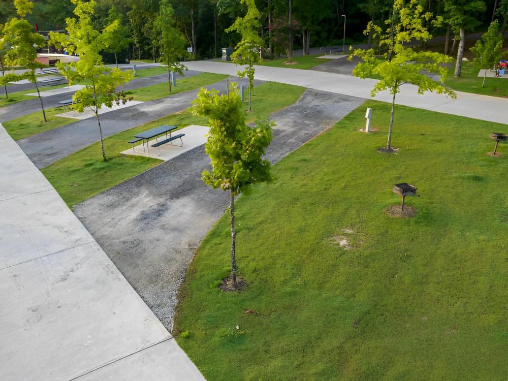 Paved site by the grass