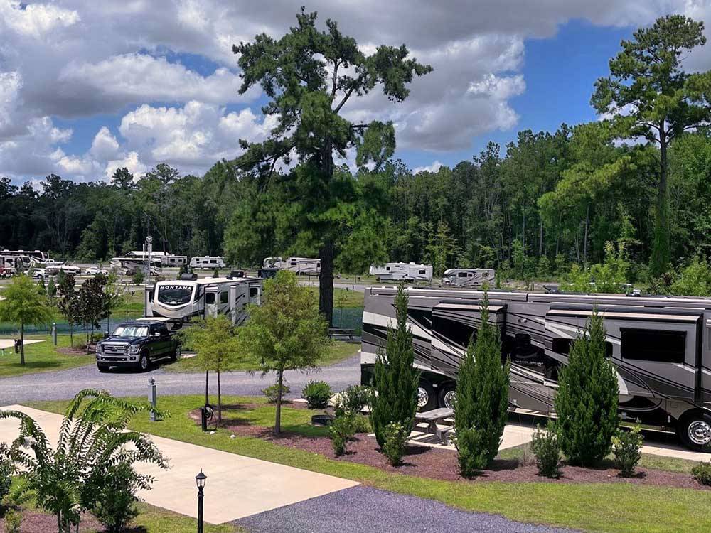 Campsites - some with camper, some vacant at MADISON RV & GOLF RESORT