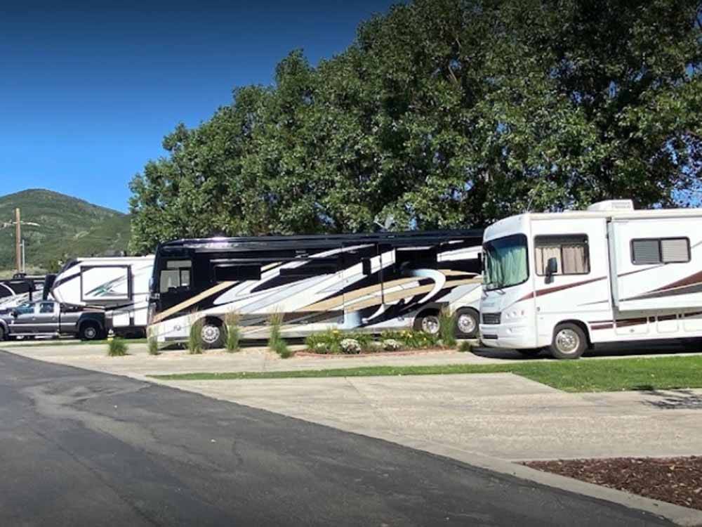 Campers in campsites at PARK CITY RV RESORT