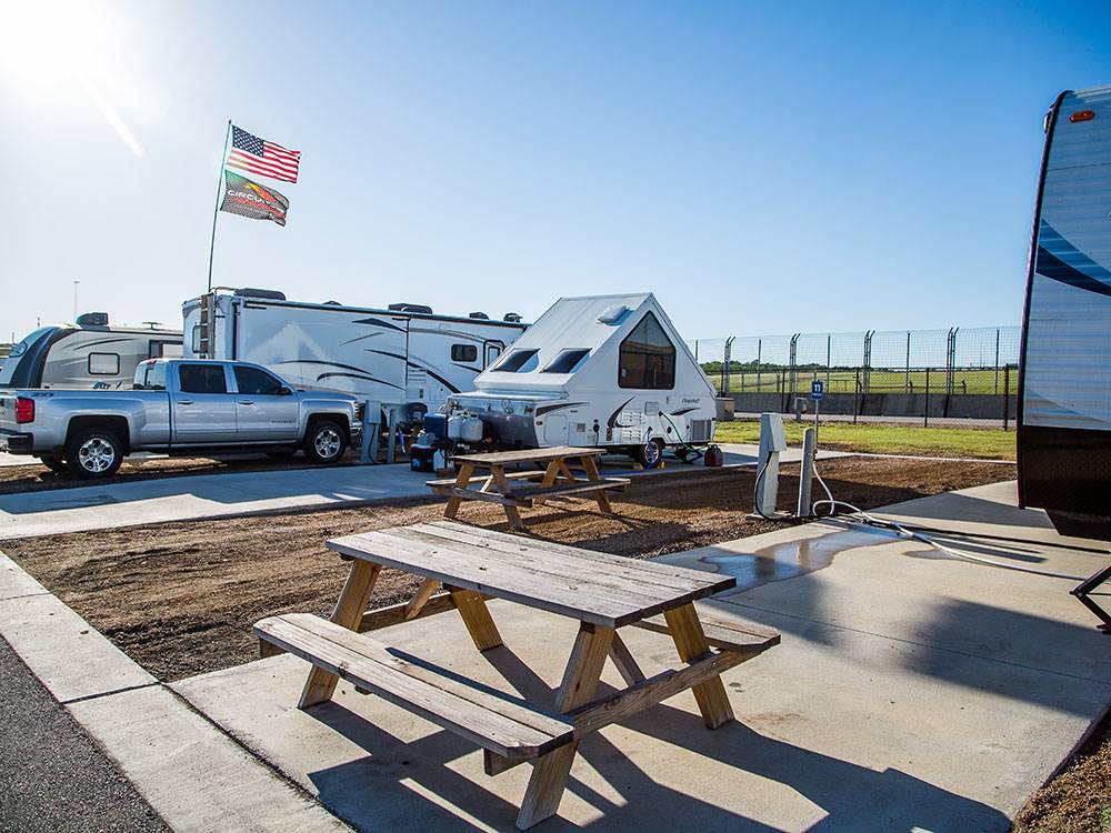 A pop up tent in a paved site at COTA CAMPING-PREMIUM RV PARK