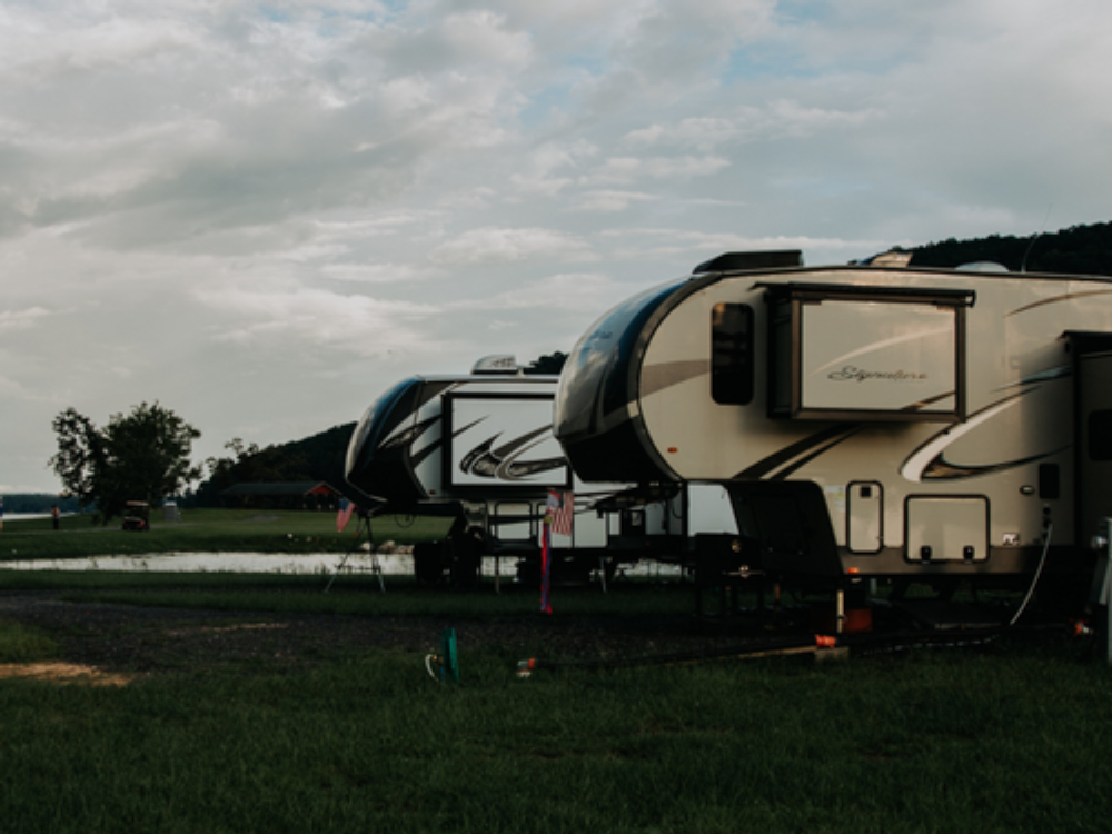 Sites by a small pond at Greensport RV Park & Campground