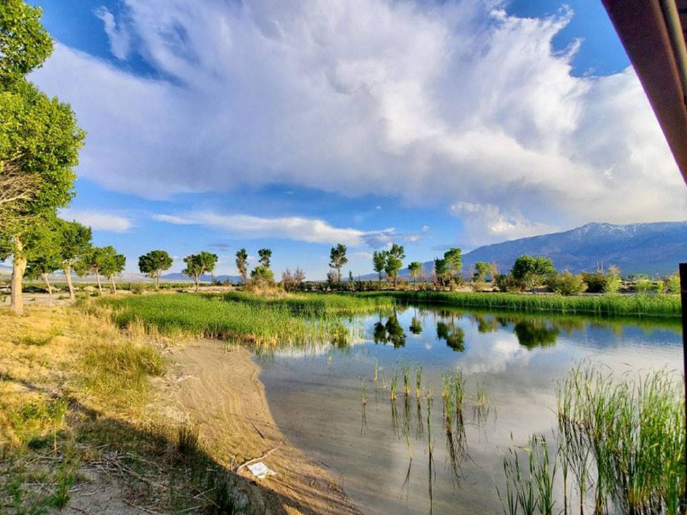 Lake Olancha with sun and clouds