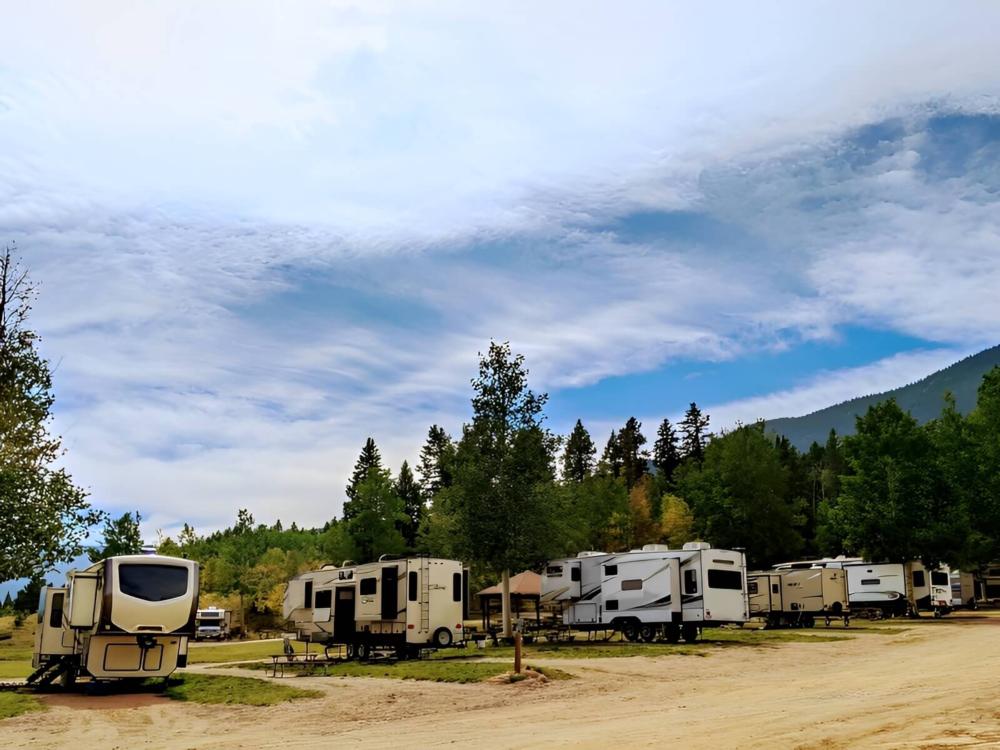 RV's parked at site Aspen Acres Campground