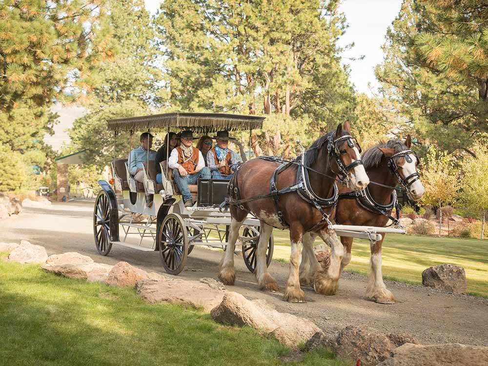 A family on a horse ride at THE RETREAT, LINKS & SPA AT SILVIES VALLEY RANCH