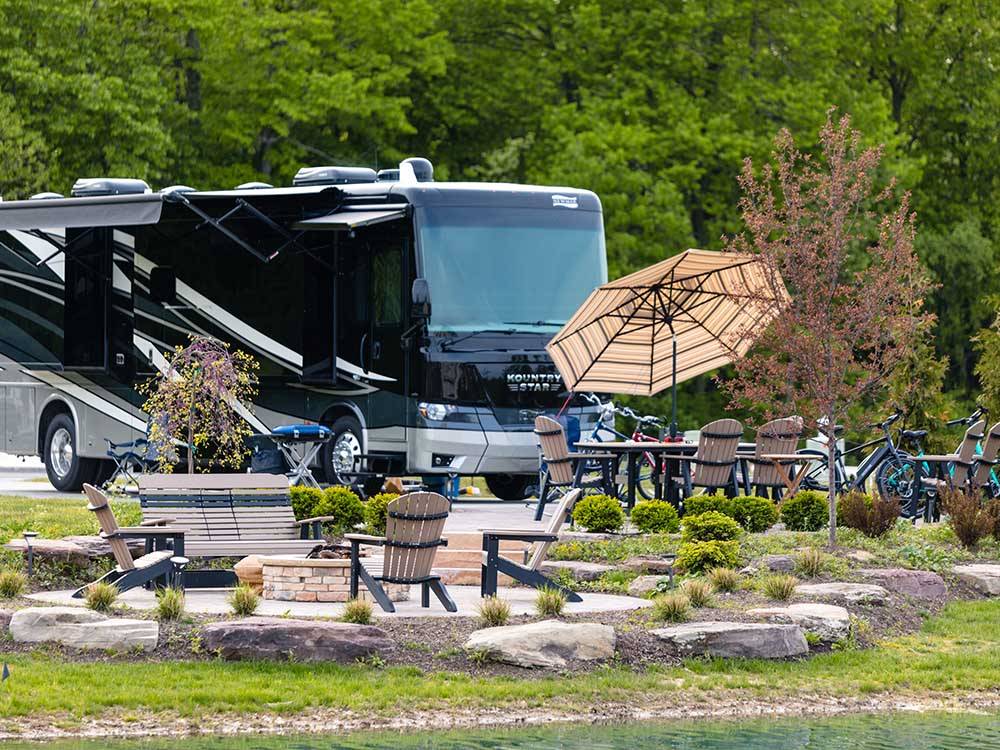 A motorhome parked in a paved site at MOTORCOACH RESORT LAKE ERIE SHORES