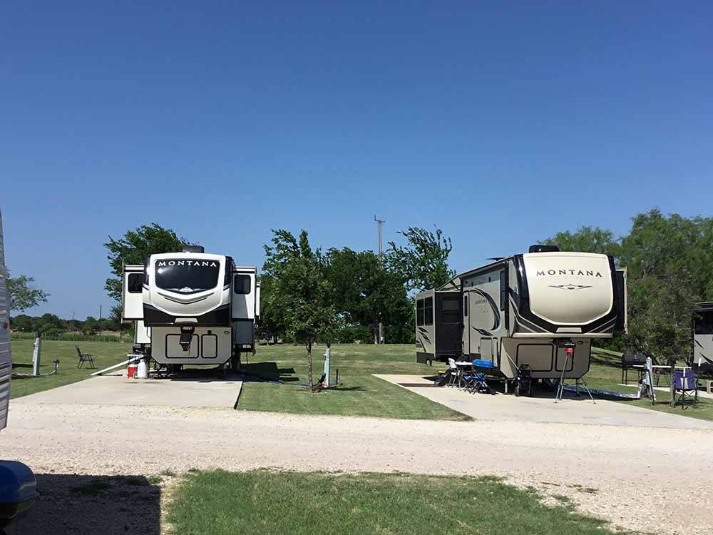 A couple of back in RV sites at BRAZOS TRAIL RV PARK