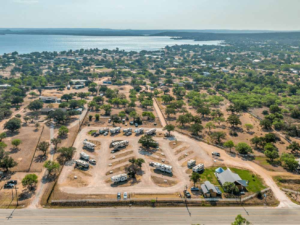 An aerial view of the campground and water at FREEDOM LIVES RANCH RV RESORT