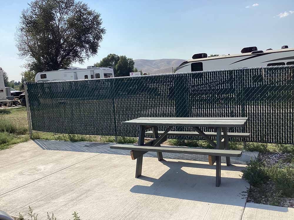 A picnic table at one of the RV sites at DILLON MOTORCOACH & RV PARK