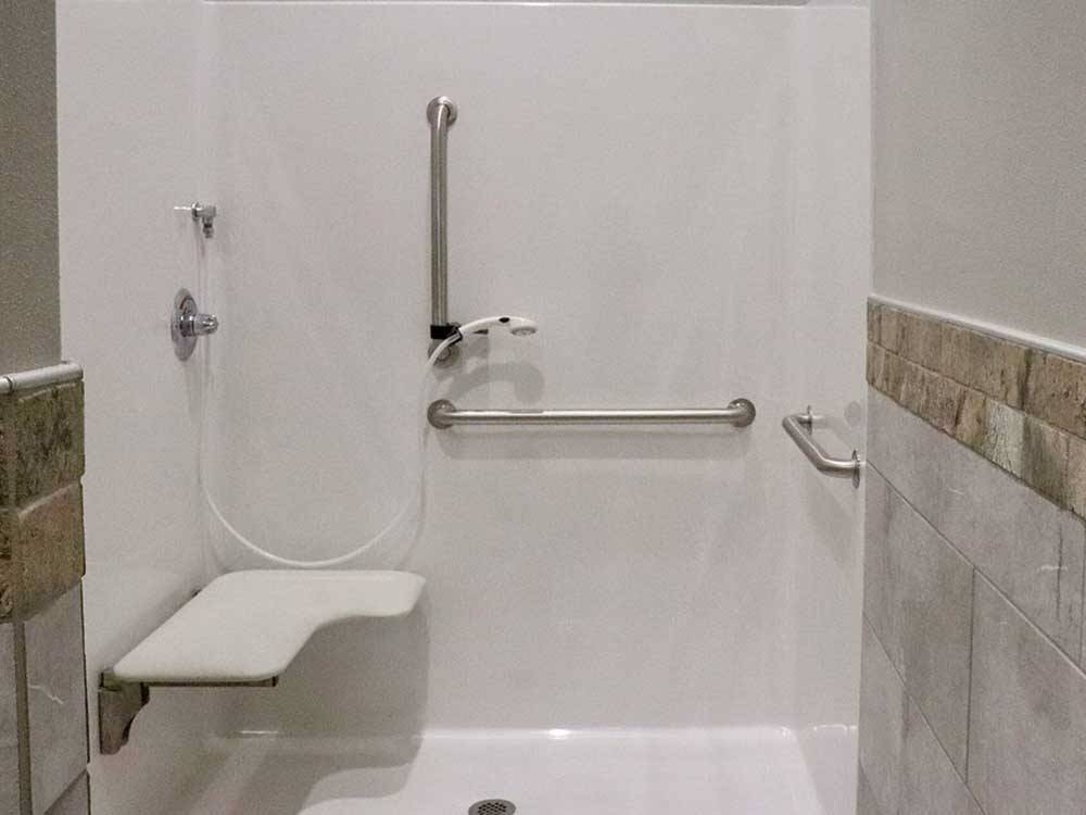 Handicap-accessible shower stall at COOL SUNSHINE RV PARK