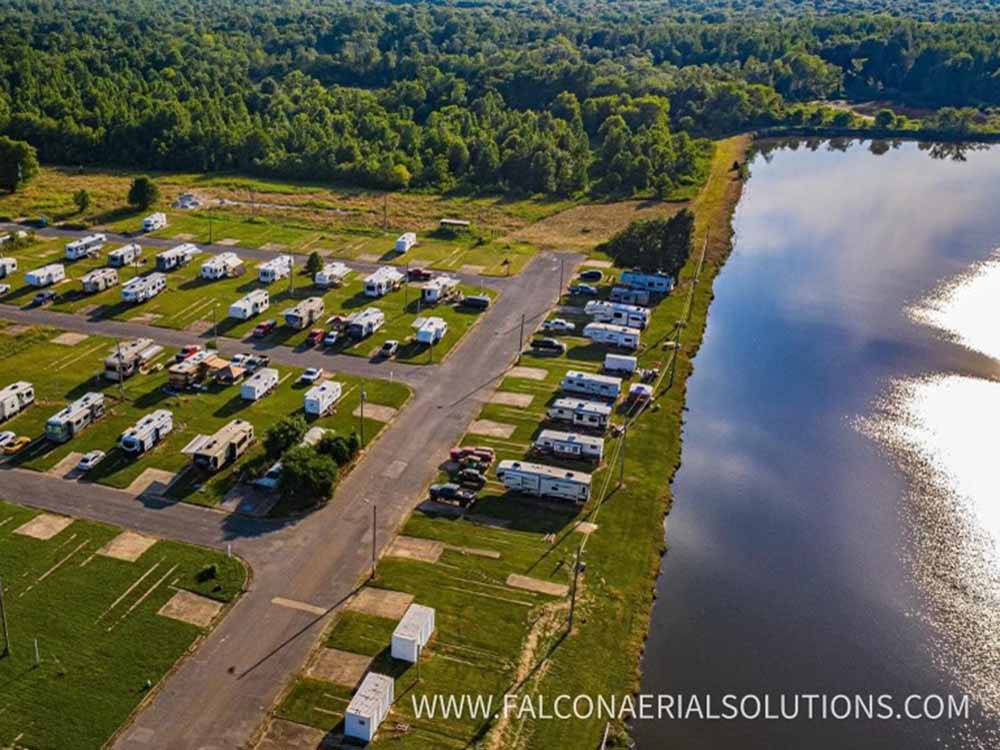 An aerial view of the campsites and water at COOK'S LAKE RV RESORT & CAMPGROUND