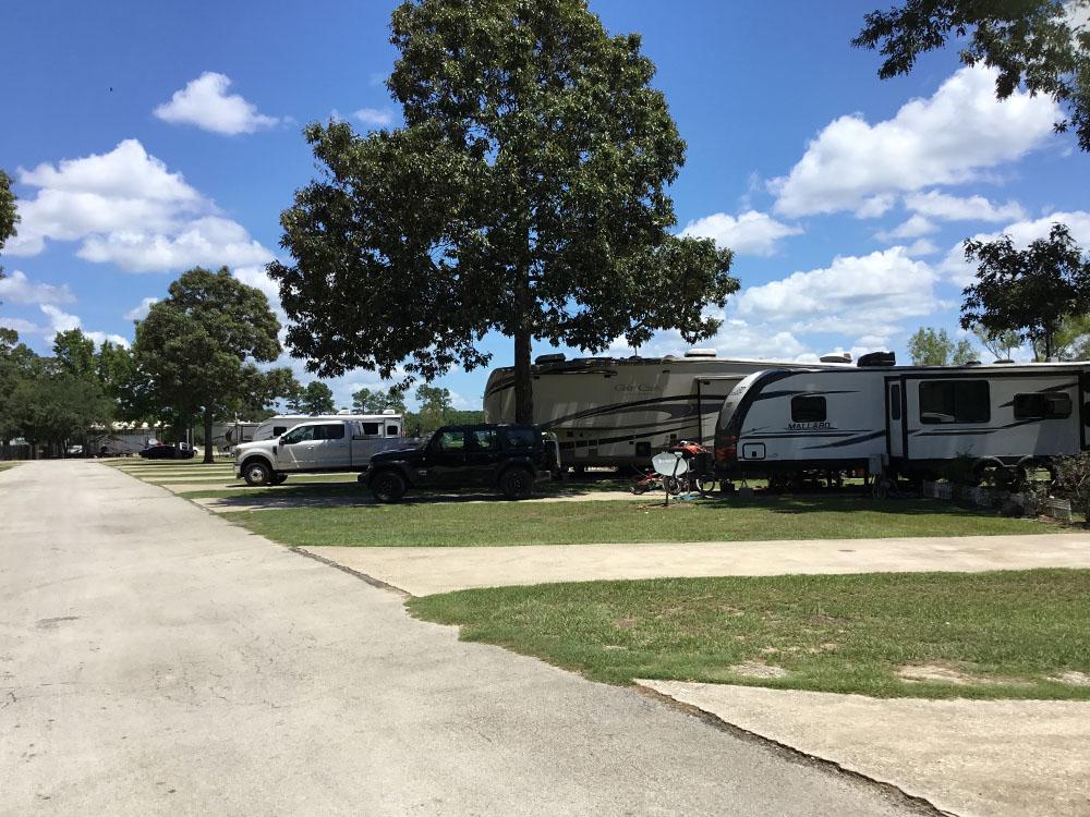 The paved road to the paved sites at THOMPSON LAKE RV RESORT