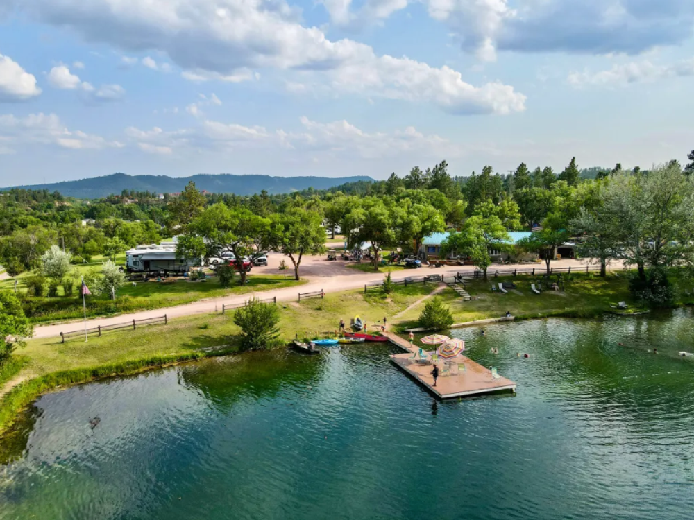 Aerial view of lake and sites at Hidden Lake Campground & Resort