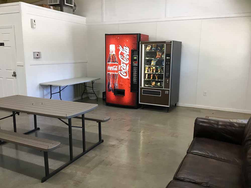 Two vending machines in the laundry room at SUNDANCE RV PARK
