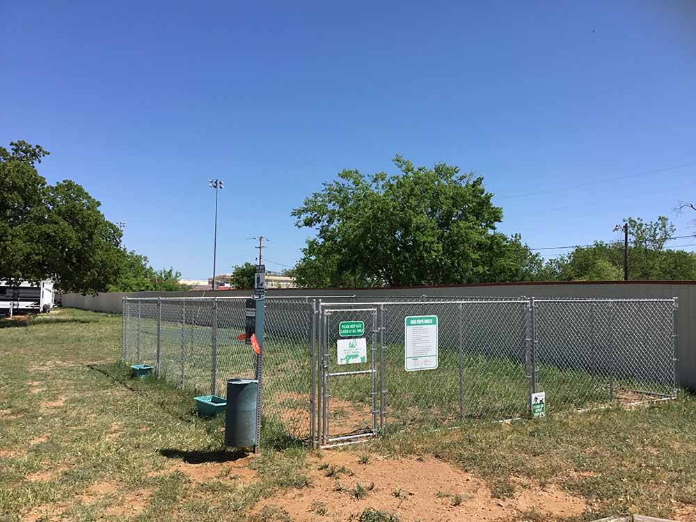 The fenced in pet area at SUNDANCE RV PARK