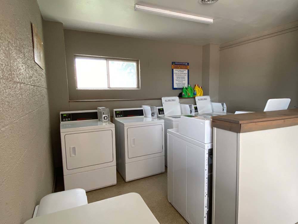Inside of the laundry room at PINE BLUFFS RV RESORT BY RJOURNEY