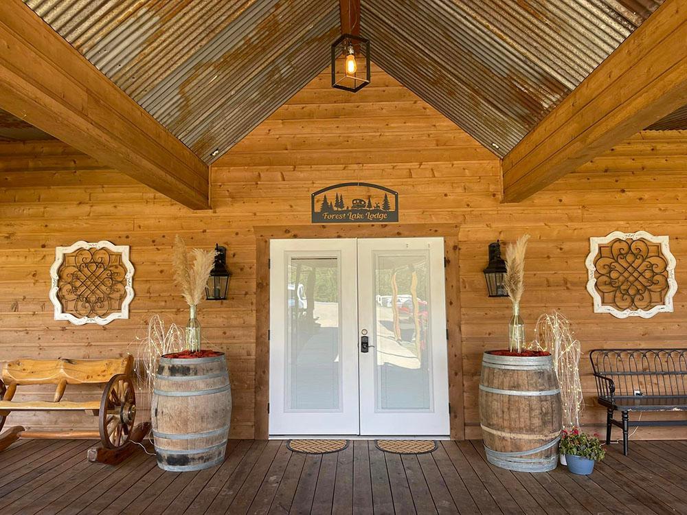 Porch and entrance to the lodge at FOREST LAKE RV PARK & EVENTS