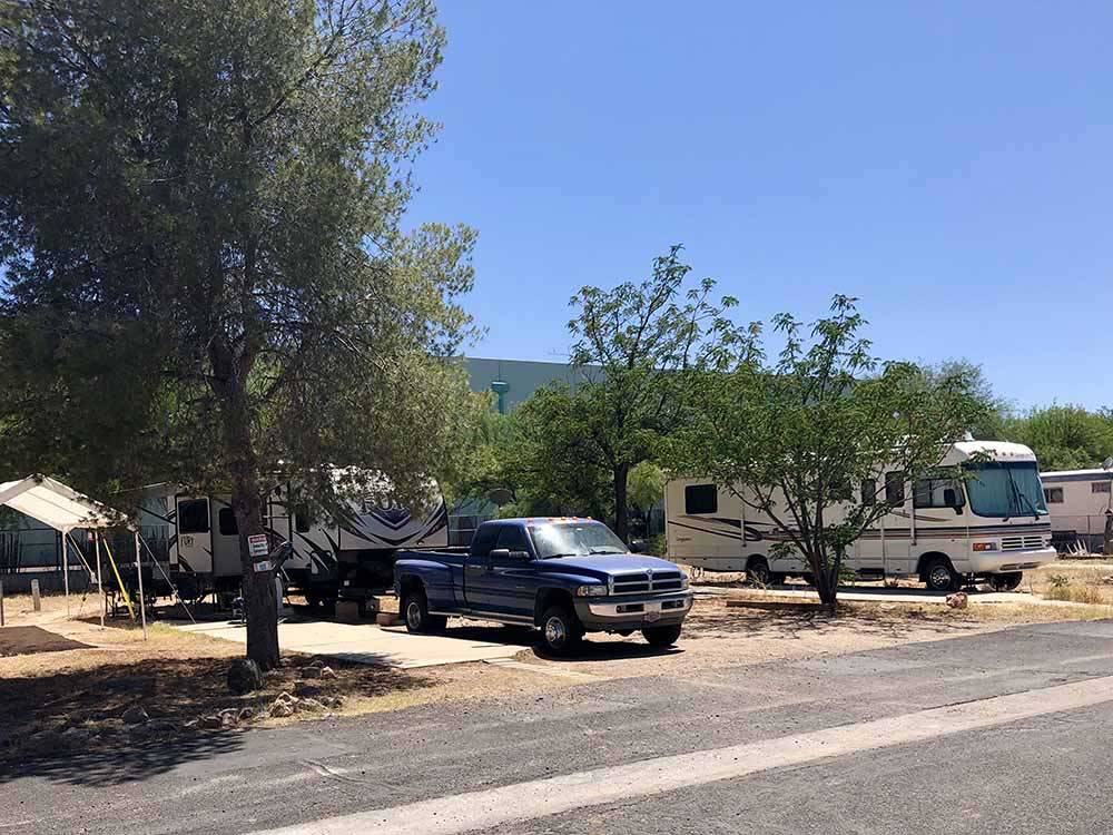A row of back in RV sites at PALO VERDE ESTATES