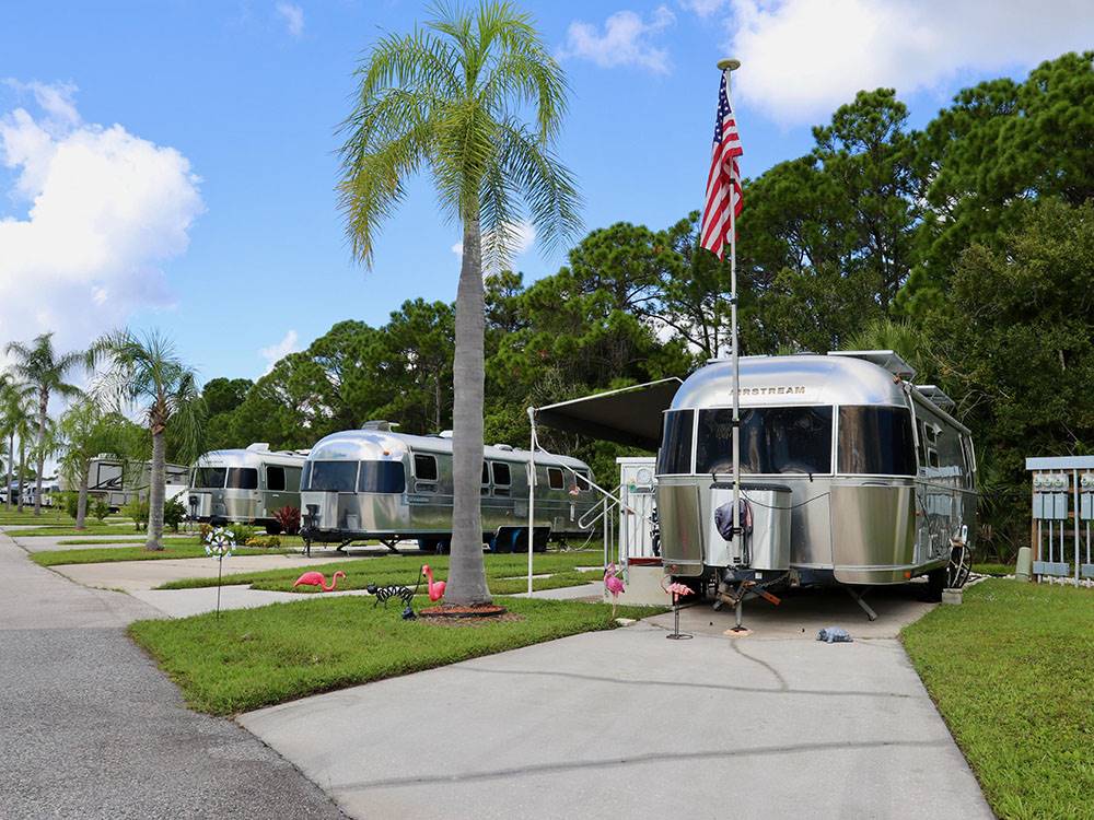 Vintage Airstream trailers in paved sites