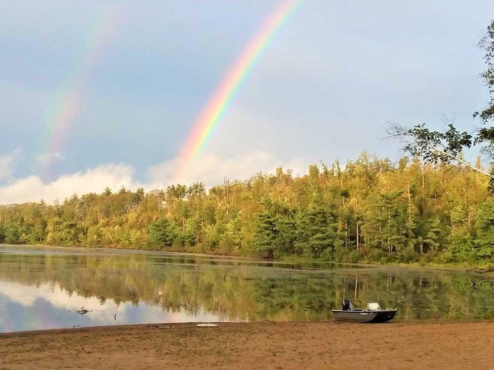 Two rainbows over the lake at QUINEBAUG COVE RESORT
