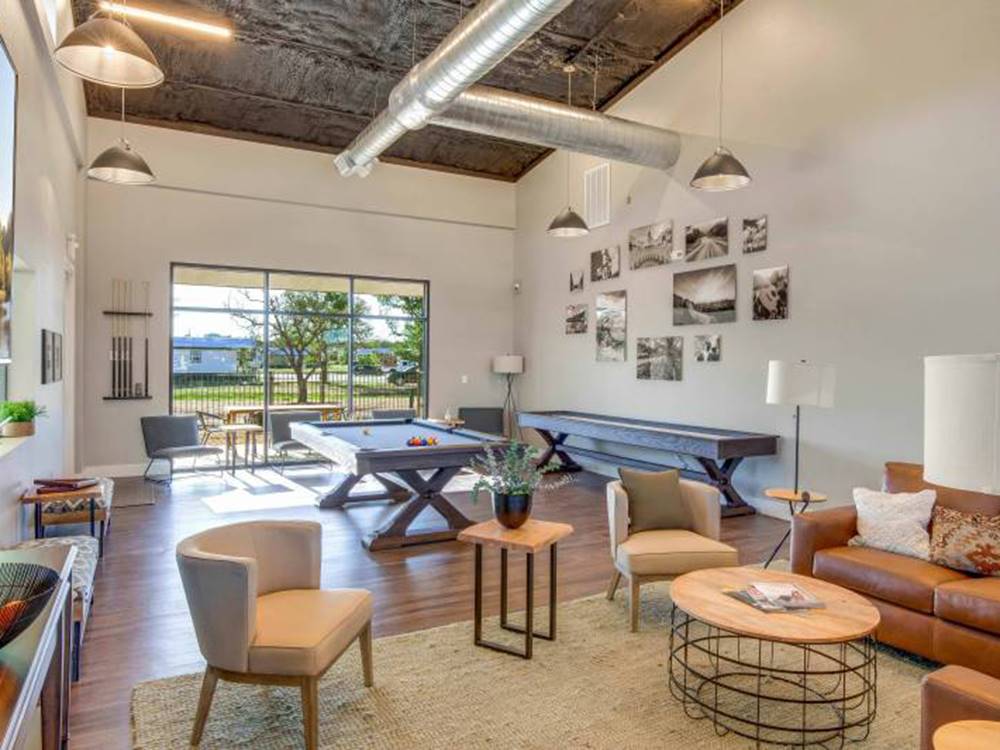 Pool table and chairs in the lobby at Jetstream RV Resort at Stone Oak Ranch