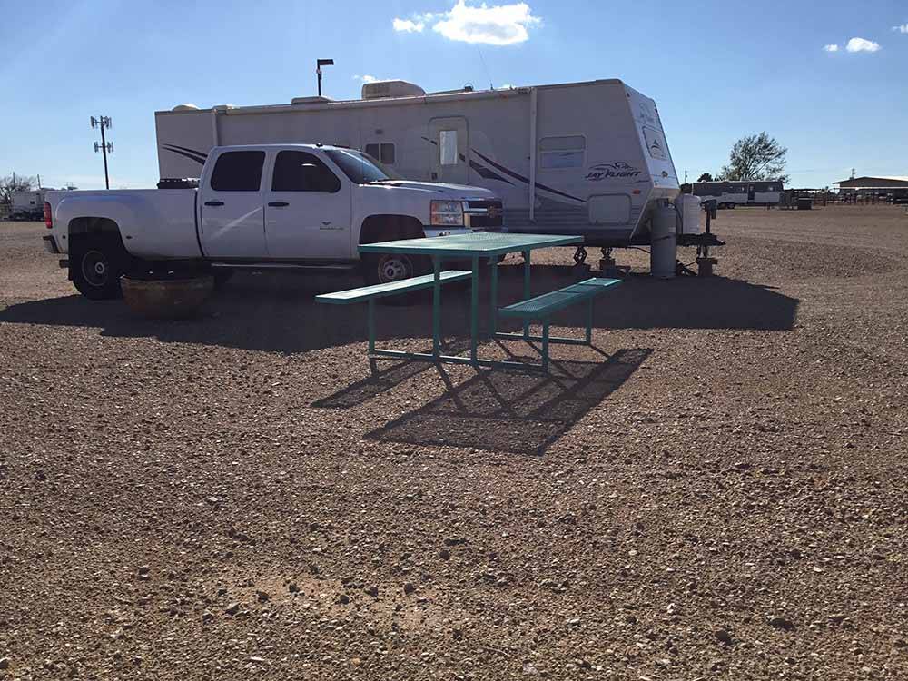 One of the sites with a picnic bench at CLOVIS POINT RV STABLES & STORAGE