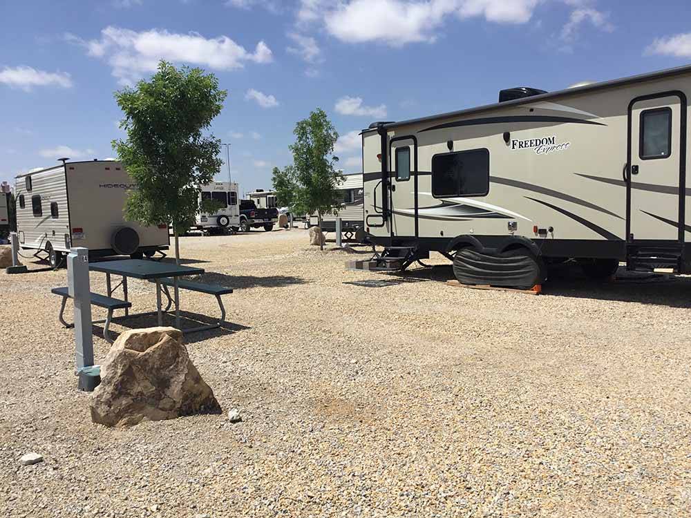 One of the gravel RV sites at BONNIE  CLYDES GETAWAY RV PARK