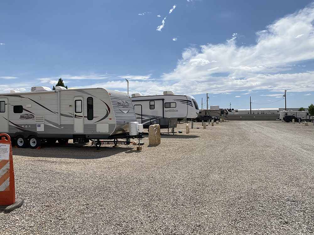 A group of gravel RV sites at BONNIE & CLYDE'S GETAWAY RV PARK