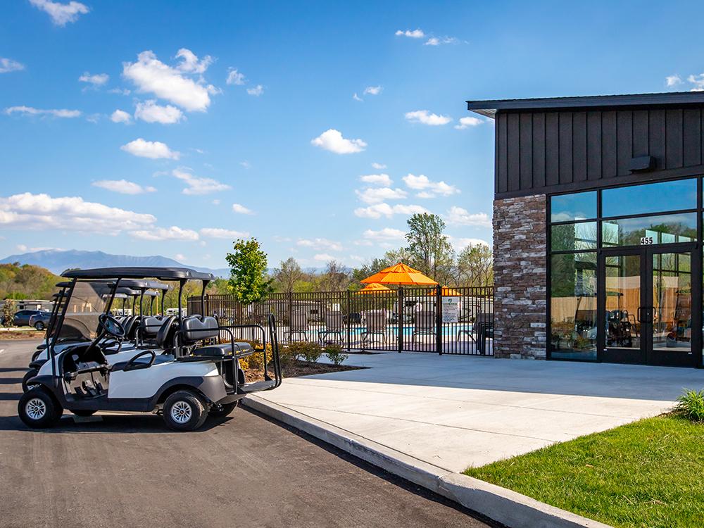 Golf carts parked in front of office at PIGEON FORGE LANDING RV RESORT