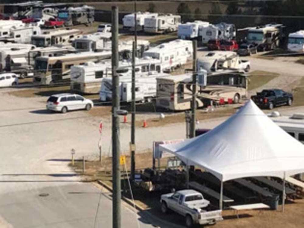 RVs and a tent on-site at BAMA RV STATION