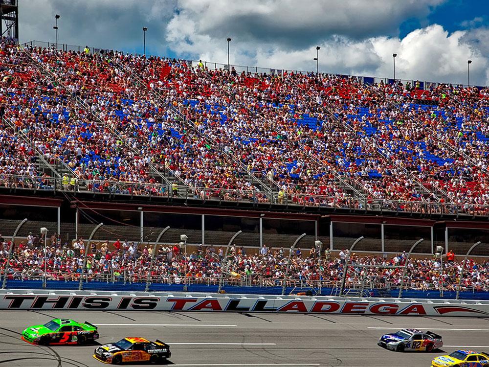 Racetrack with packed crowd at TALLADEGA PIT STOP RV PARK & CAMPGROUND