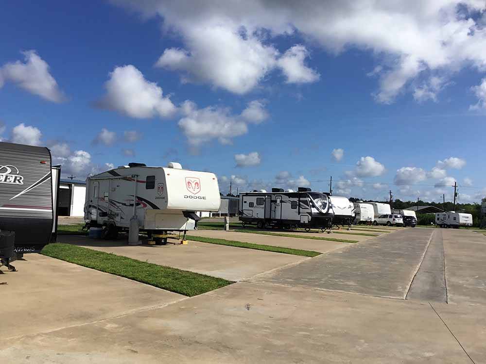 A row of paved RV sites at BEAUMONT RV & MARINA