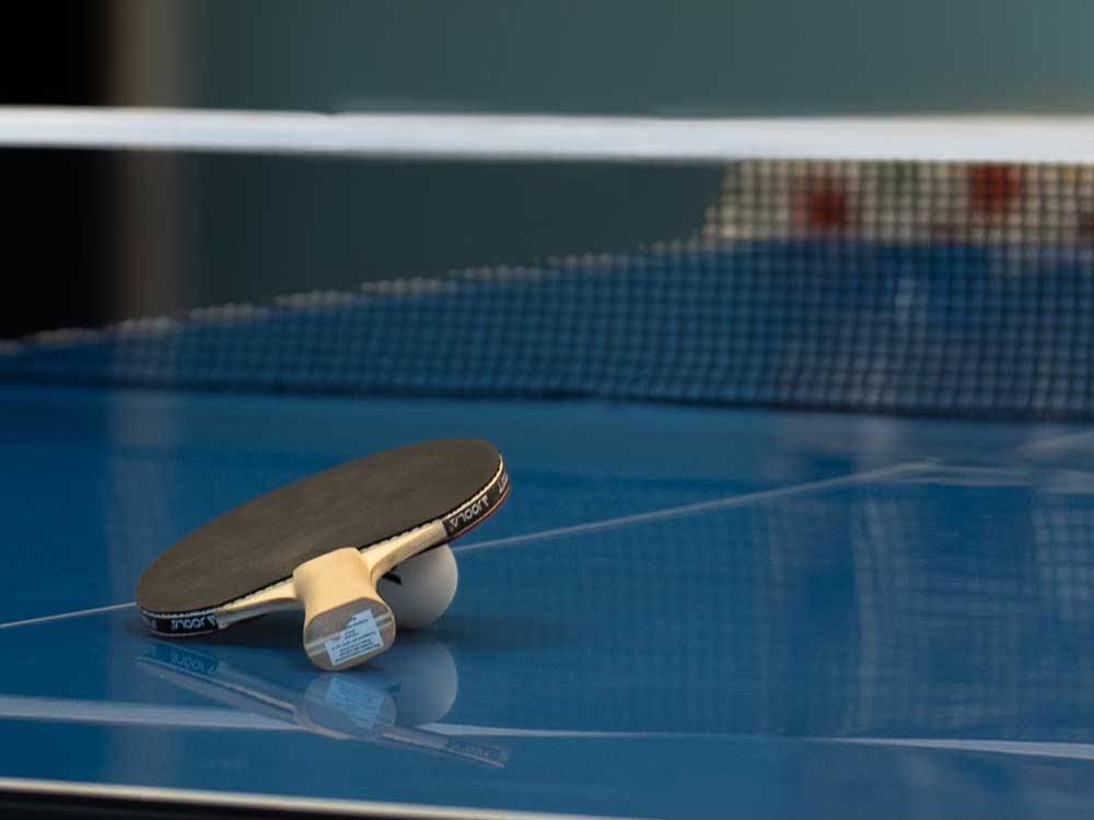 A close-up of the ping pong table at REEL CHILL RV RESORT