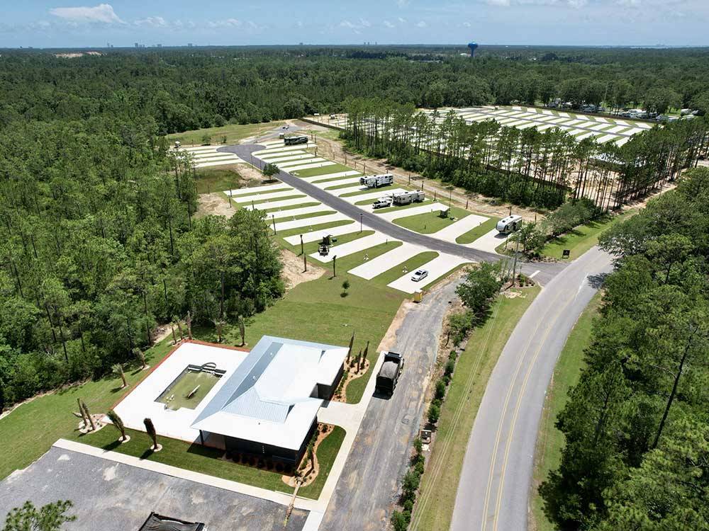 Aerial view of the office, swimming pool and sites at WHISPERING PINES RV RESORT EAST AND WEST