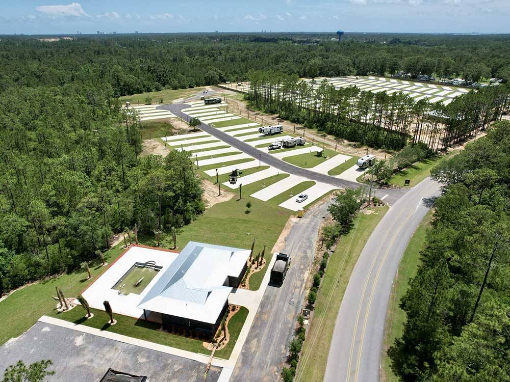 Aerial view of the office, swimming pool and sites at Whispering Pines RV Resort East and West