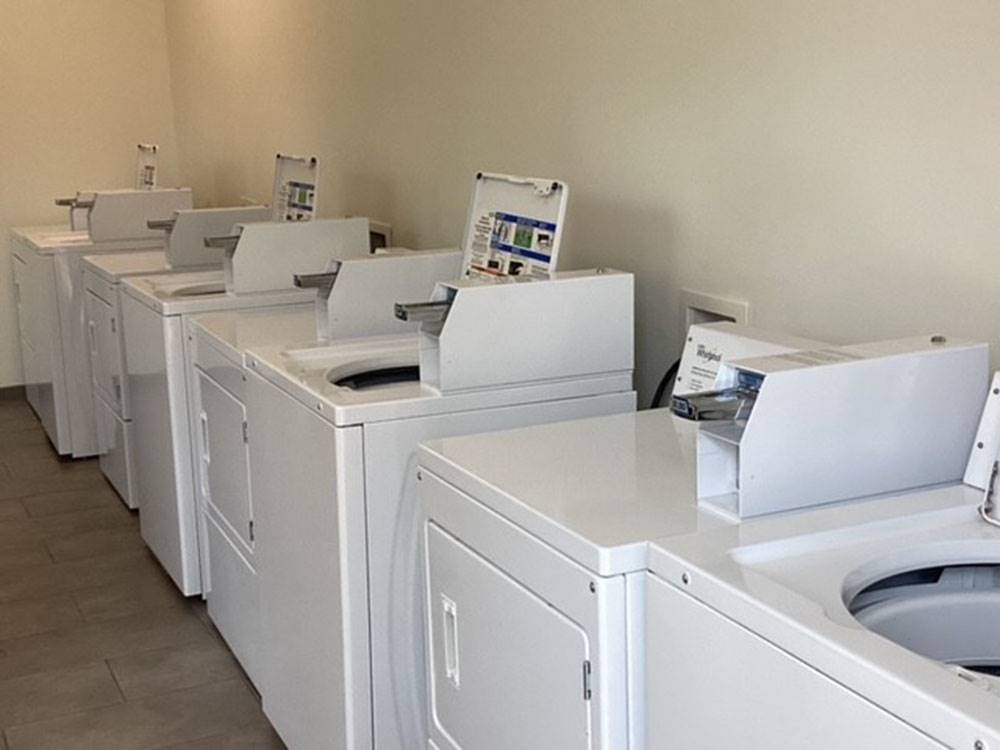 Inside of the laundry room at Whispering Pines RV Resort East and West