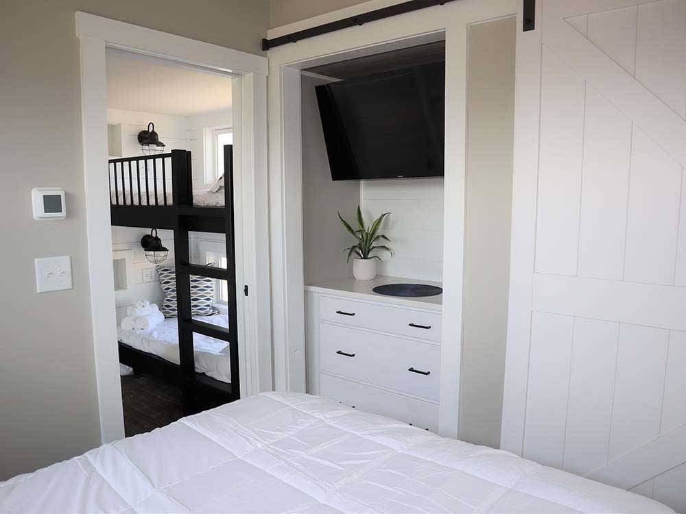 The bunk beds next to the master bedroom at BAYFRONT RESORT AT CROSS VIEW