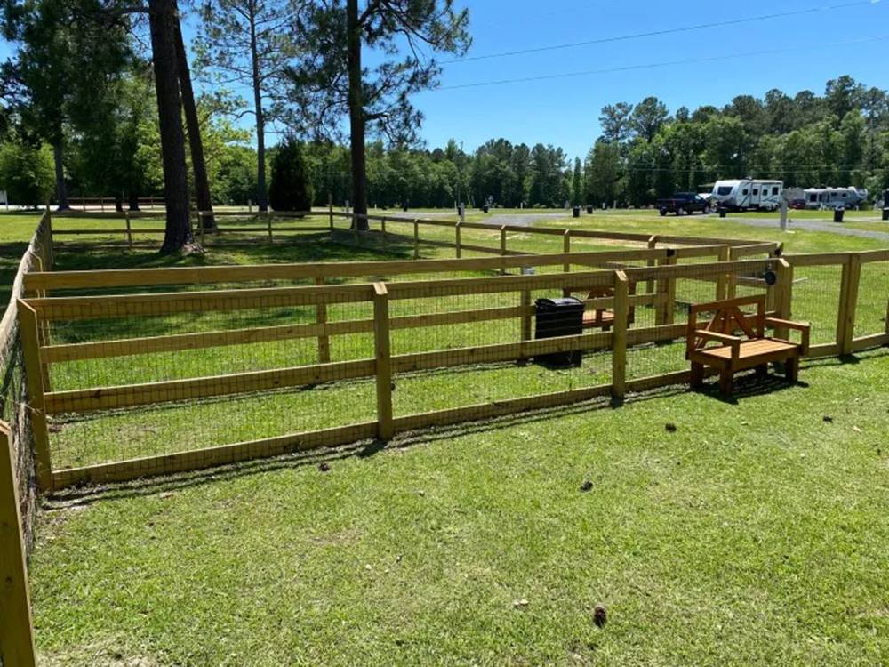 Fenced dog area at Pebble Hill RV Resort