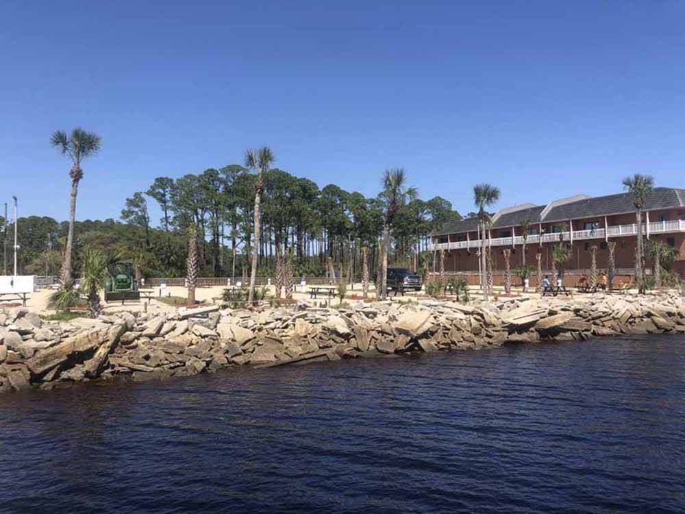 A view of the campsites from the water at BAYSIDE RV RESORT AND MARINA