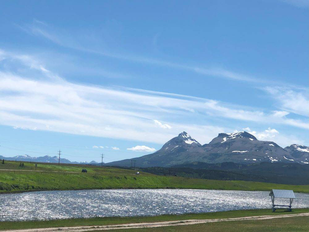 View of the mountains from the pond at Buffalo Calf Campground