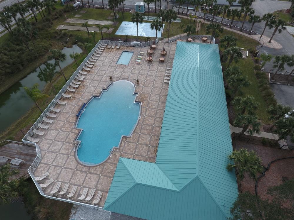 Outdoor recreation area with pool at OCEAN GROVE RV RESORT