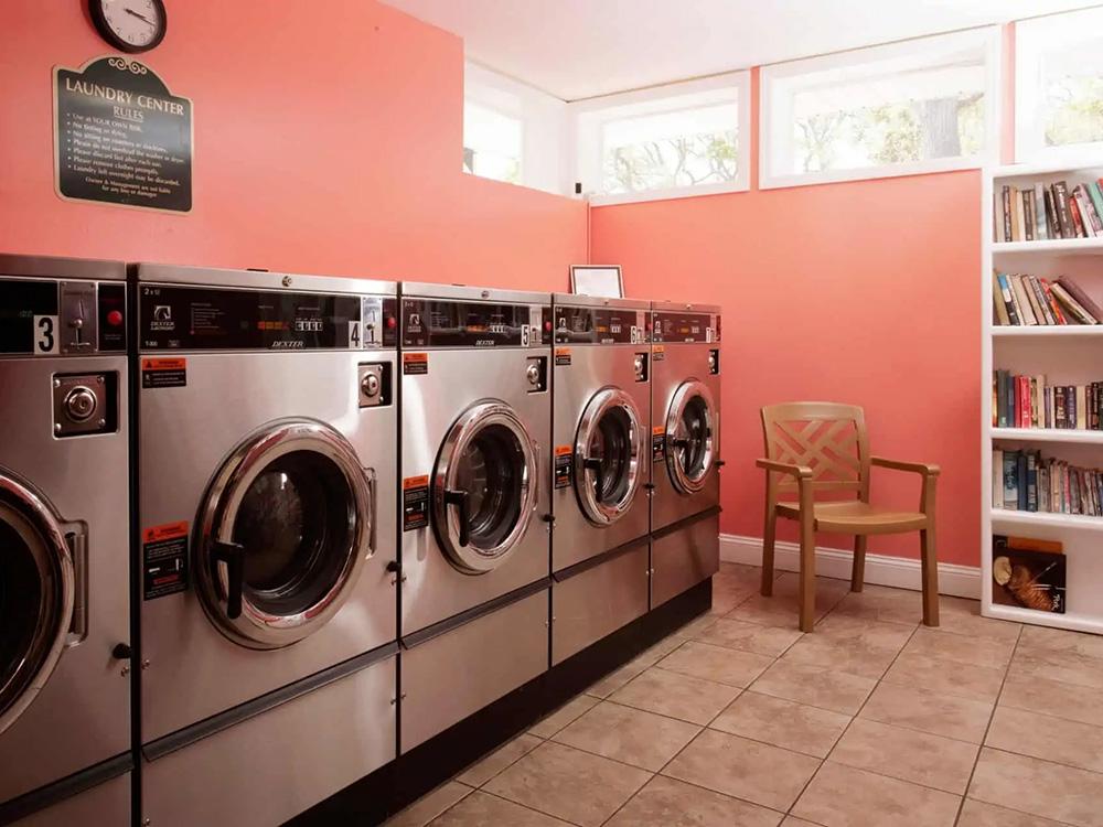 Laundry center with bookshelf at OCEAN GROVE RV RESORT