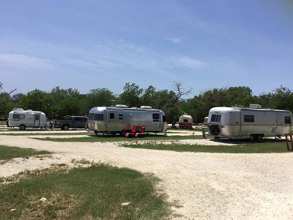 Campers in campsites at OFF THE VINE RV PARK