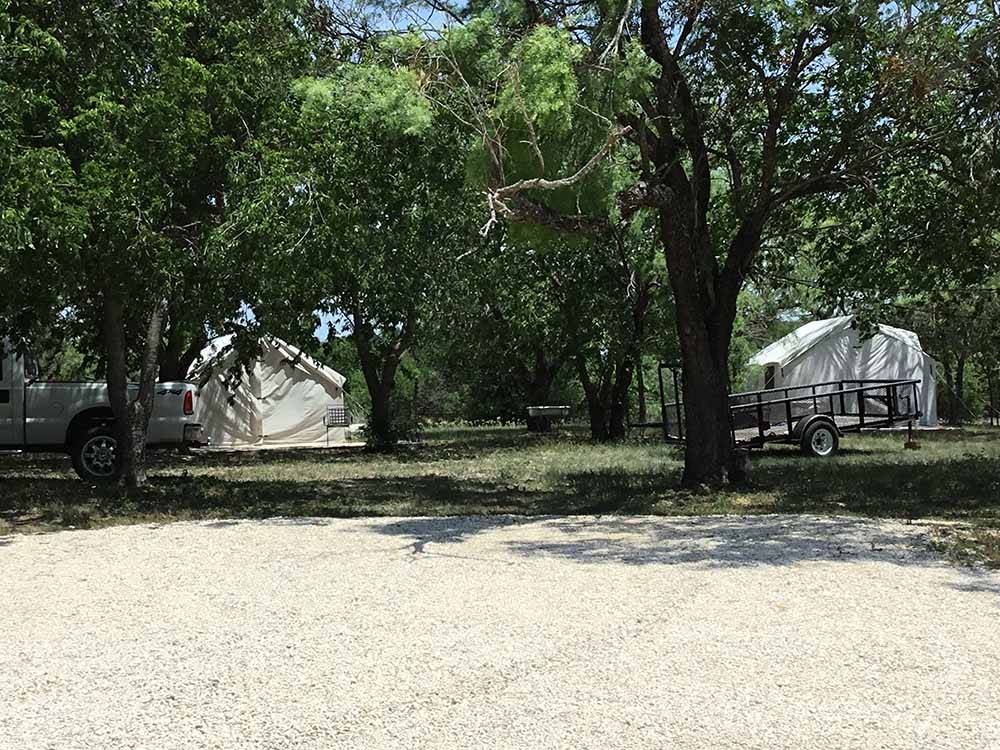 Two tent sites in shady area at OFF THE VINE RV PARK