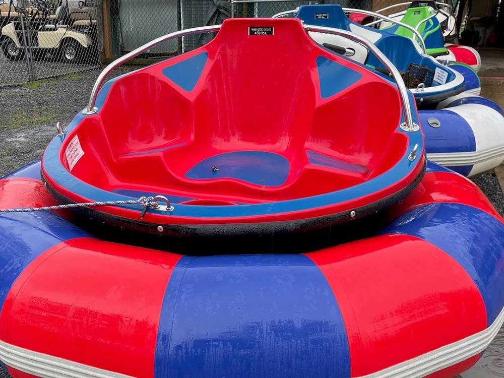 Water bumper boats ready for use at SPLASH MAGIC RV RESORT BY RJOURNEY