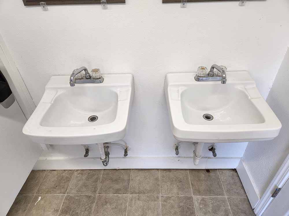 Clean sinks in public bathrooms at LEWIS & CLARK CAMPGROUND & RV PARK