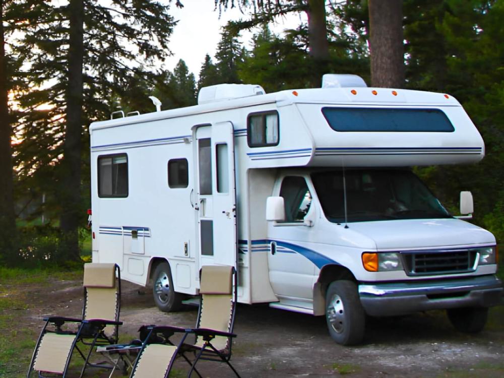 A Class C motorhome in a site